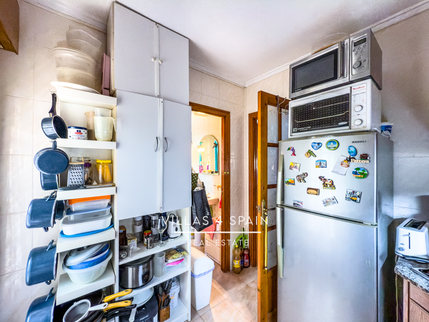 Resale - Copy: 2 Bed 2 Bath townhouse  with a front garden and Lake View in Ciudad Quesada Lo Pepin - avenida de españa - Alicante